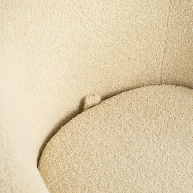 Fauteuil crapaud pivotant rembourré beige