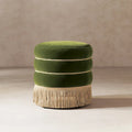 Pouf rond tapissé avec franges en fil doré