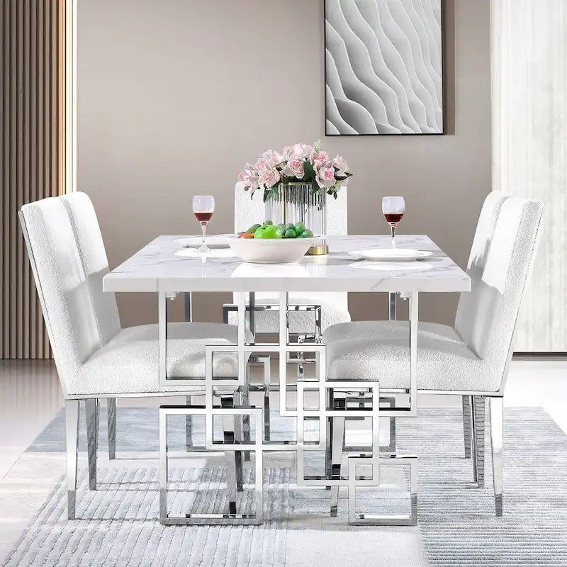 Table de salle à manger imitation marbre avec piètement métallique géométrique